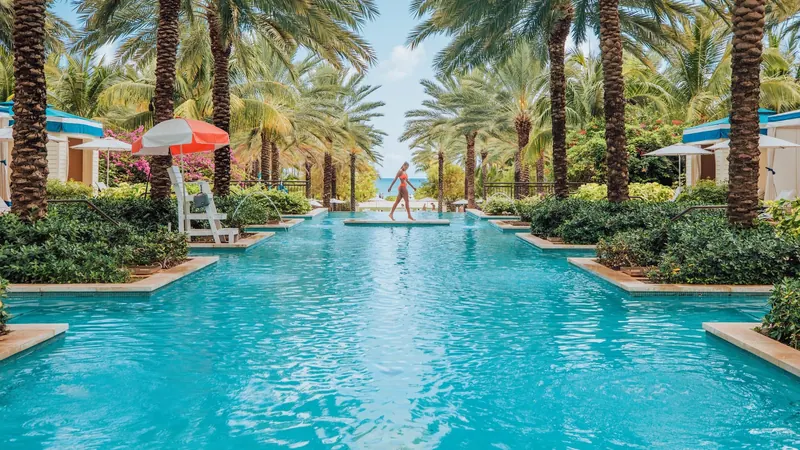Grand Hyatt Nassau luxury resort pool with palm trees